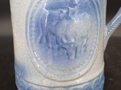 (2) Blue and White Stoneware Pitchers with Relief Designs - 6