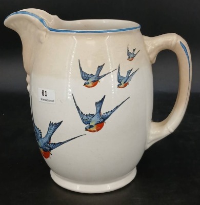 Buffalo Pottery Pitcher with Swallows