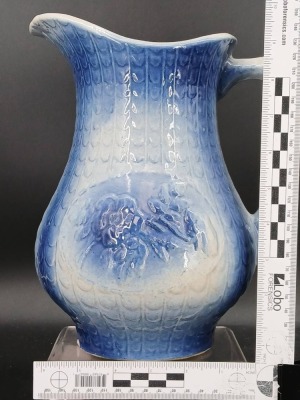 (2) Blue and White Stoneware Pitchers with Relief Designs - 10
