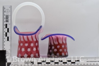 (2) Fenton Art Glass cranberry opalescent Stars and Stripes pcs: 3"h top hat; 6.75"h basket - 9