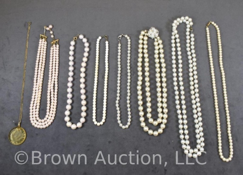 Assortment of pearl and faux pearl necklaces