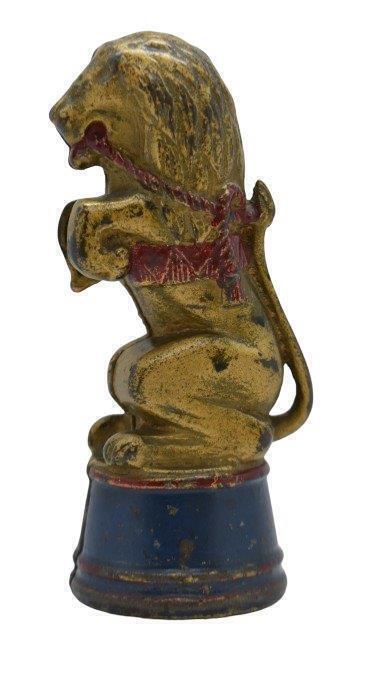 Cast Iron A.C. Williams decorated lion on tub bank, 5.5"h