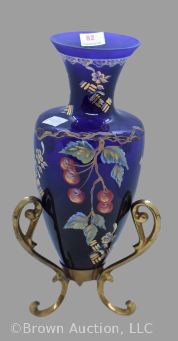 Fenton Art Glass 10" vase in 3-ftd. gold stand, vase is cobalt to lavender coloring with HP grapes/ leaves and vines, artist signed
