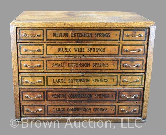 Oak country store "springs" display and storage counter top box, 6-drawer with black stenciling