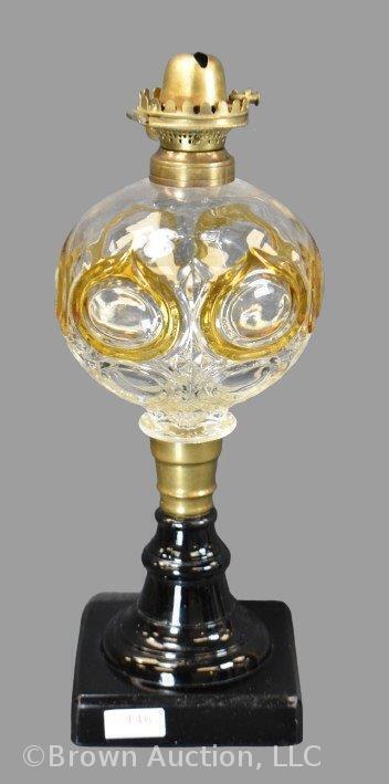 Kerosene lamp in dbl. Bullseye pattern with amber highlights, black base