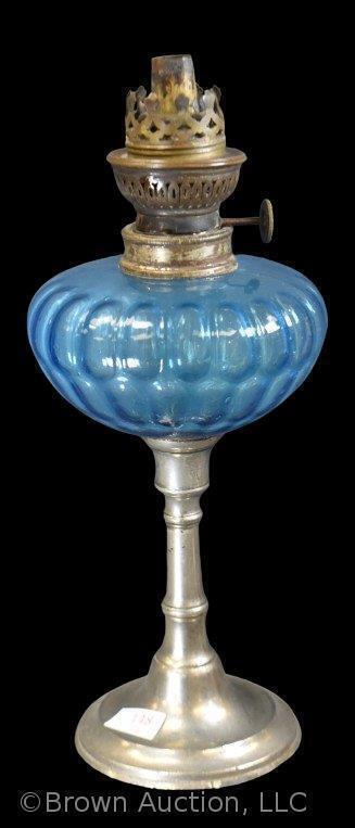 Kerosene lamp on silver base, blue glass font, 9" tall