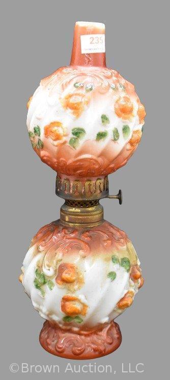 Rust and white milk glass miniature oil lamp, swirl pattern with embossed roses and scrolls