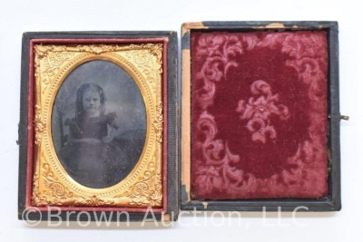 Daguerreotype photo of young girl in embossed case