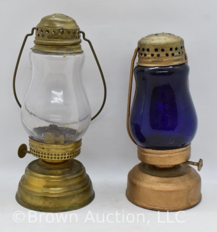 (2) Vintage skater's lanterns, 7"h clear and 6.5"h cobalt