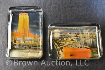 (2) World's Fair souvenir paperweights