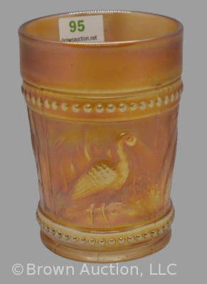 Carnival Glass Stork and Rushes tumbler, marigold