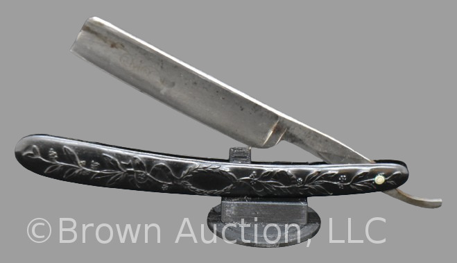 Challenge Razor Works straight razor with black embossed design handle