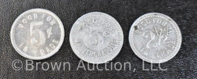 Assortment of (8) trade tokens - 13