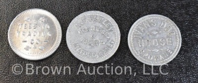 Assortment of (8) trade tokens - 14