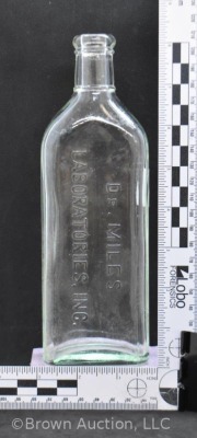 Dr. Miles Laboratories, Inc. embossed medicine bottle, 8.25" tall - 7