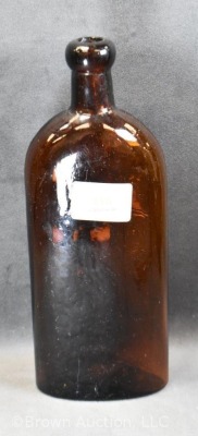 Warner's Safe Kidney and Liver Cure embossed bottle, 9.5" tall - 3