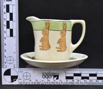 Roseville Juvenile Cup and Saucer - 8