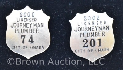 (2) City of Omaha Licensed Journeyman Plumber badges, 2000 and 2002