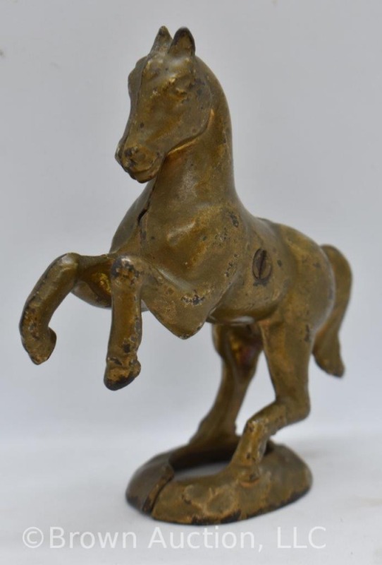 Cast Iron Arcade/ A.C. Williams small rearing horse on base bank, gold, 5"