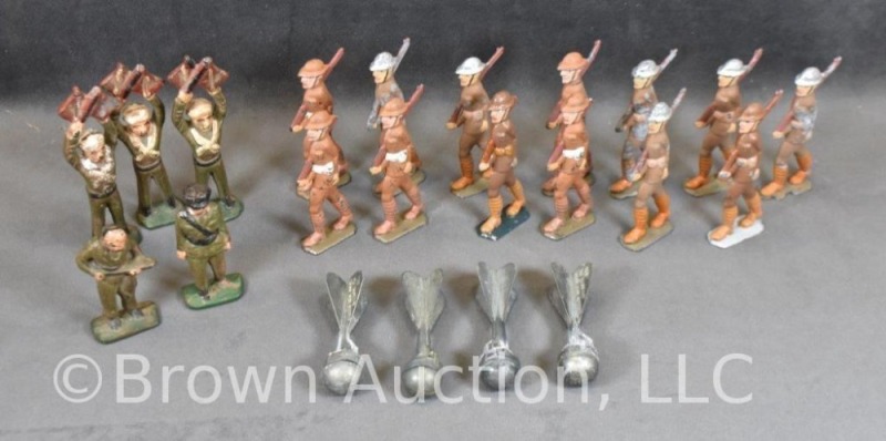 Collection of lead toy military men and (4) 1950's metal cap grenades