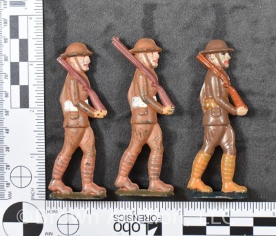 Collection of lead toy military men and (4) 1950's metal cap grenades - 14