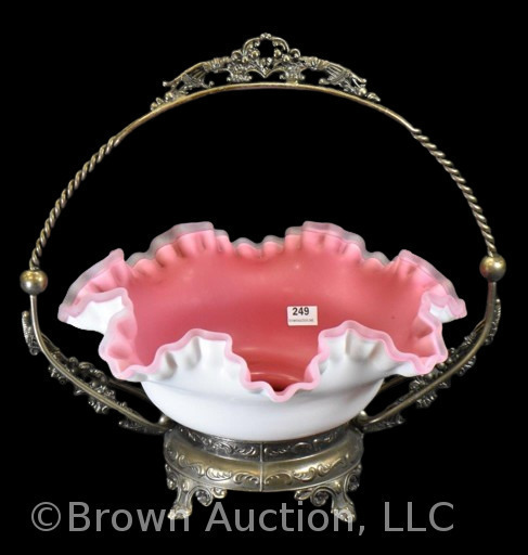 Bride's bowl in ornate handled holder, 10"d pink cased glass ruffled bowl