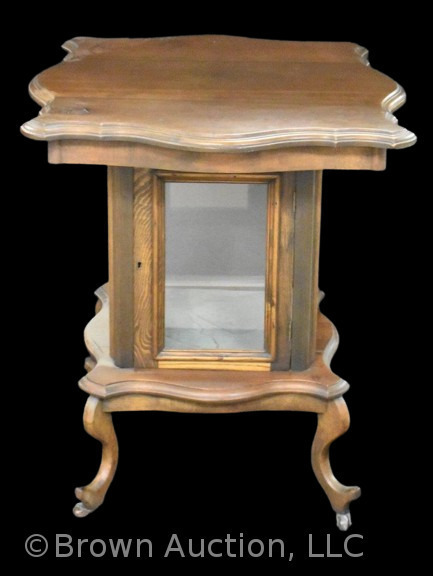 Unusual parlor table w/ enclosed glass area on lower shelf for protected display