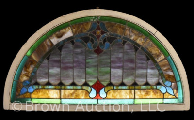 Antique stained glass window w/ arched top