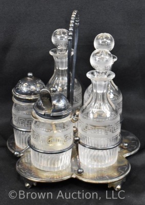 5 pc. castor set (bottles all match), holder sits atop a silverplate scalloped and ftd. plateau - 2