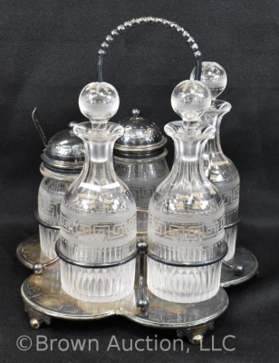 5 pc. castor set (bottles all match), holder sits atop a silverplate scalloped and ftd. plateau - 3