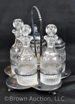 5 pc. castor set (bottles all match), holder sits atop a silverplate scalloped and ftd. plateau - 4