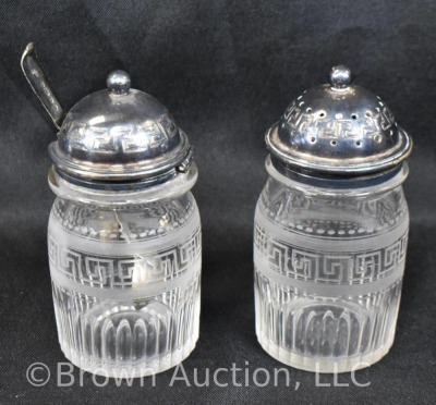 5 pc. castor set (bottles all match), holder sits atop a silverplate scalloped and ftd. plateau - 10