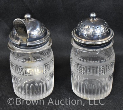 5 pc. castor set (bottles all match), holder sits atop a silverplate scalloped and ftd. plateau - 11