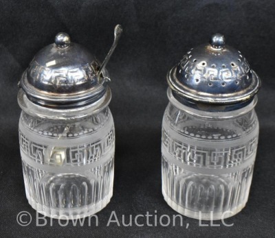 5 pc. castor set (bottles all match), holder sits atop a silverplate scalloped and ftd. plateau - 12