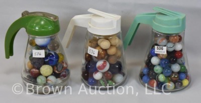 (3) Old syrup jars full of mixed marbles