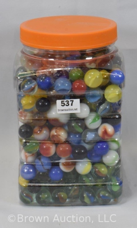 Large jar of mixed marbles