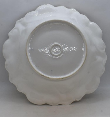 Unm. porcelain 10.25"d bowl, soft yellow roses/ black border w/ scattered white flowers, circle mold mark - 4