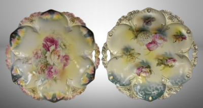 (2) R.S. Prussia Mold 82 11"d cake plates, both have nice floral designs, circle mold marks + 1 w/ red mark