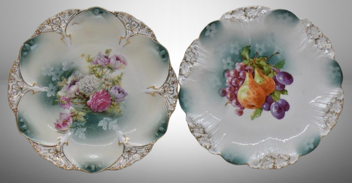 (2) R.S. Prussia 8.5"d plates, red mark: Icicle mold w/ fruit; Mold 82, mixed flowers in glass bowl