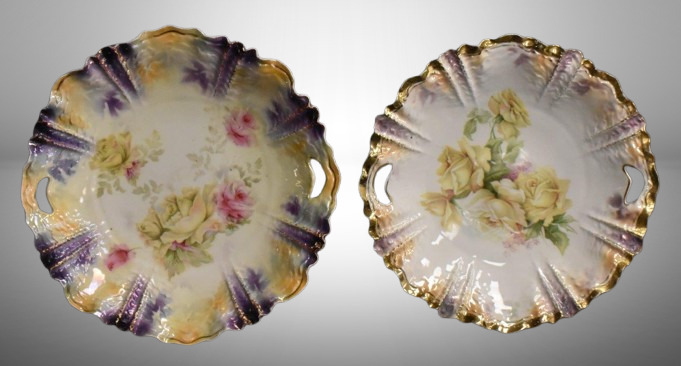 (2) R.S. Prussia Mold 259 10.5"d cake plates, both w/ roses, red mark