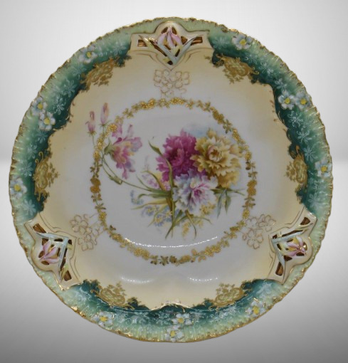 R.S. Prussia 10"d bowl w/unusual pierced border mold, multi-colored flowers, circle mold mark