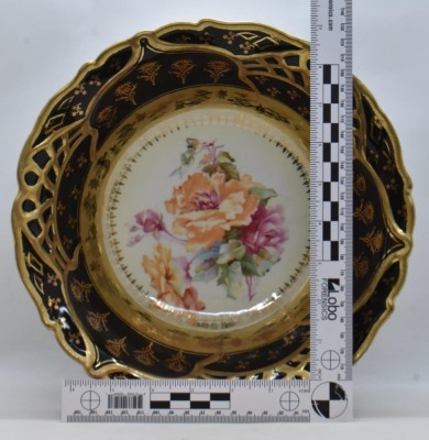 Handpainted porcelain 10.25" bowl, large roses in center surrounded by wide black border and heavy gold, circle mold mark - 5