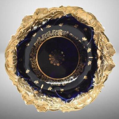 Handpainted porcelain 10.5"d cobalt bowl w/heavy gold border and stenciling