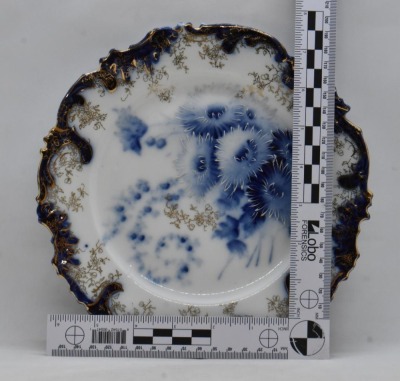 (2) Handpainted porcelain cobalt plates w/ flowers and decorative stenciling - 5