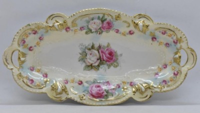 (2) R.S. Prussia celery trays, 12" x 6", floral designs: Mold 207, red mark; Mold 82 - 7