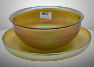 L.C. Tiffany gold Favrile finger bowl and underplate