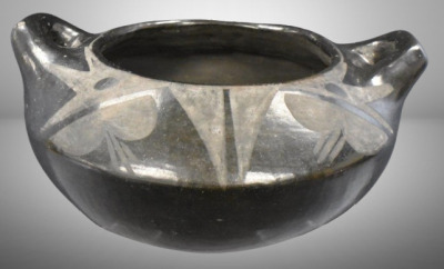 Native American black on black pottery handled bowl