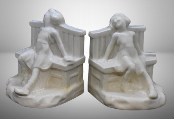 Rookwood pottery #2446 bookends, "Girl on Bench" - white