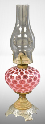 Cranberry opalescent Coin Dot 9" kerosene lamp, decorative metal base