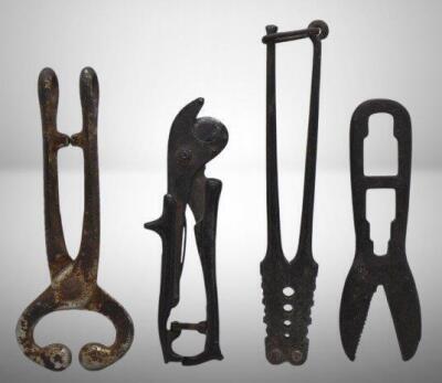 Assortment of Cast Iron items incl. alligator wrench, bull nose lead, crimper, etc.